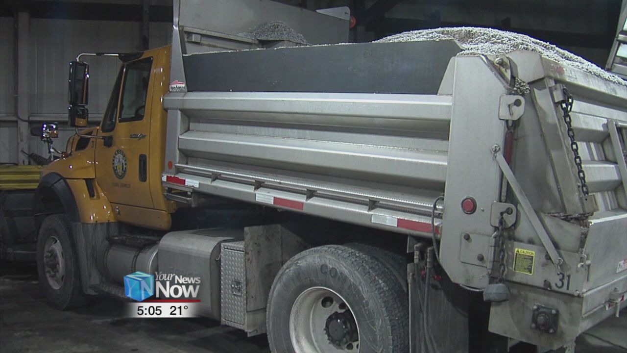 City and county road crews out after early snowfall